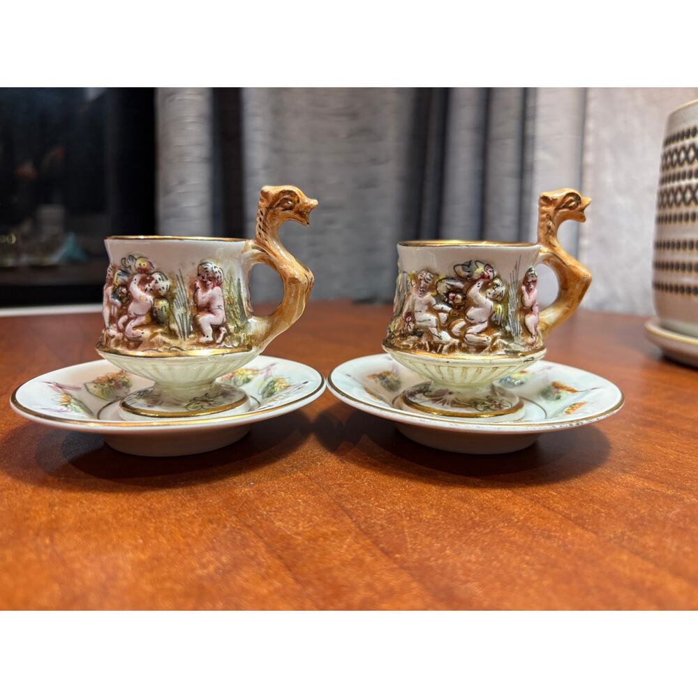 Miniature Demitasse Capodimonte Dragon Cherub Tea cup and saucers (Set of 2)